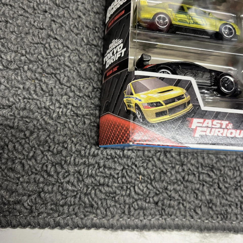 Paquete de 5 Hot Wheels Fast & Furious 2021 Impala GT-40 MITSUBISHI EVO NISSAN 350Z Foto 2 de 4