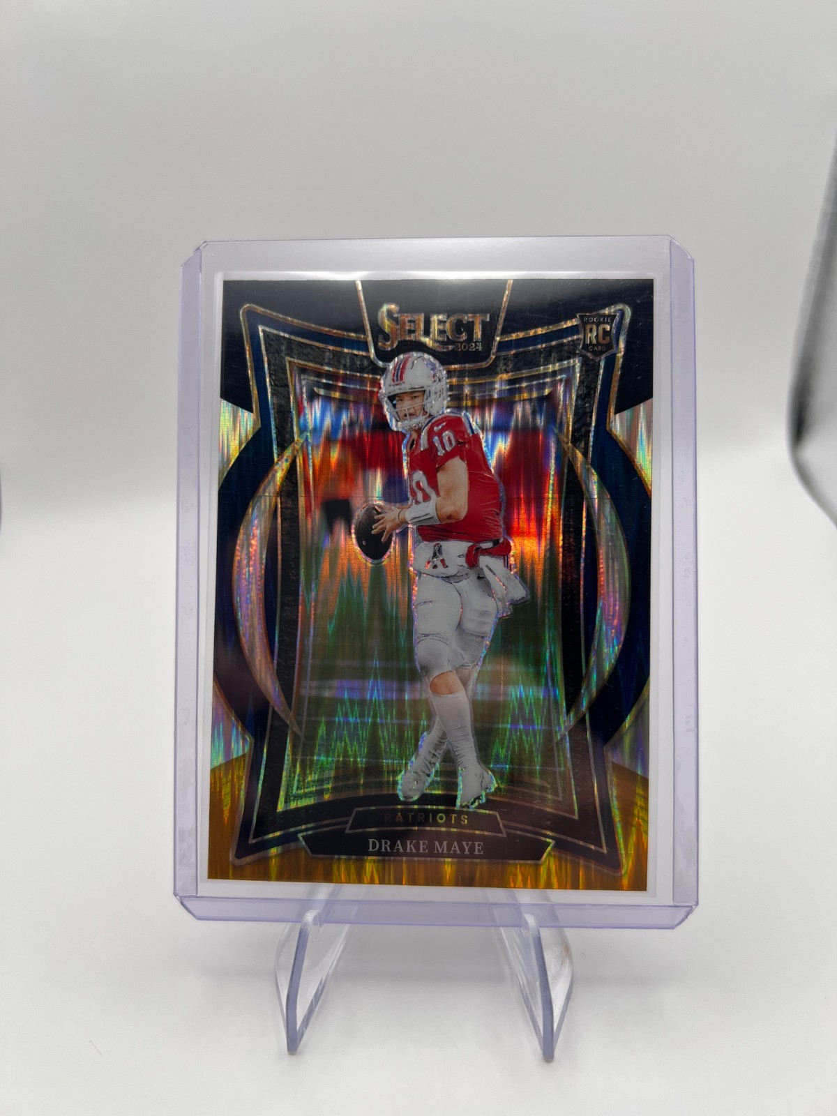 2024 Panini Select - Concourse Drake Maye #27 Black & Gold Shock Prizm (RC)