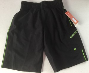 black and green swim trunks