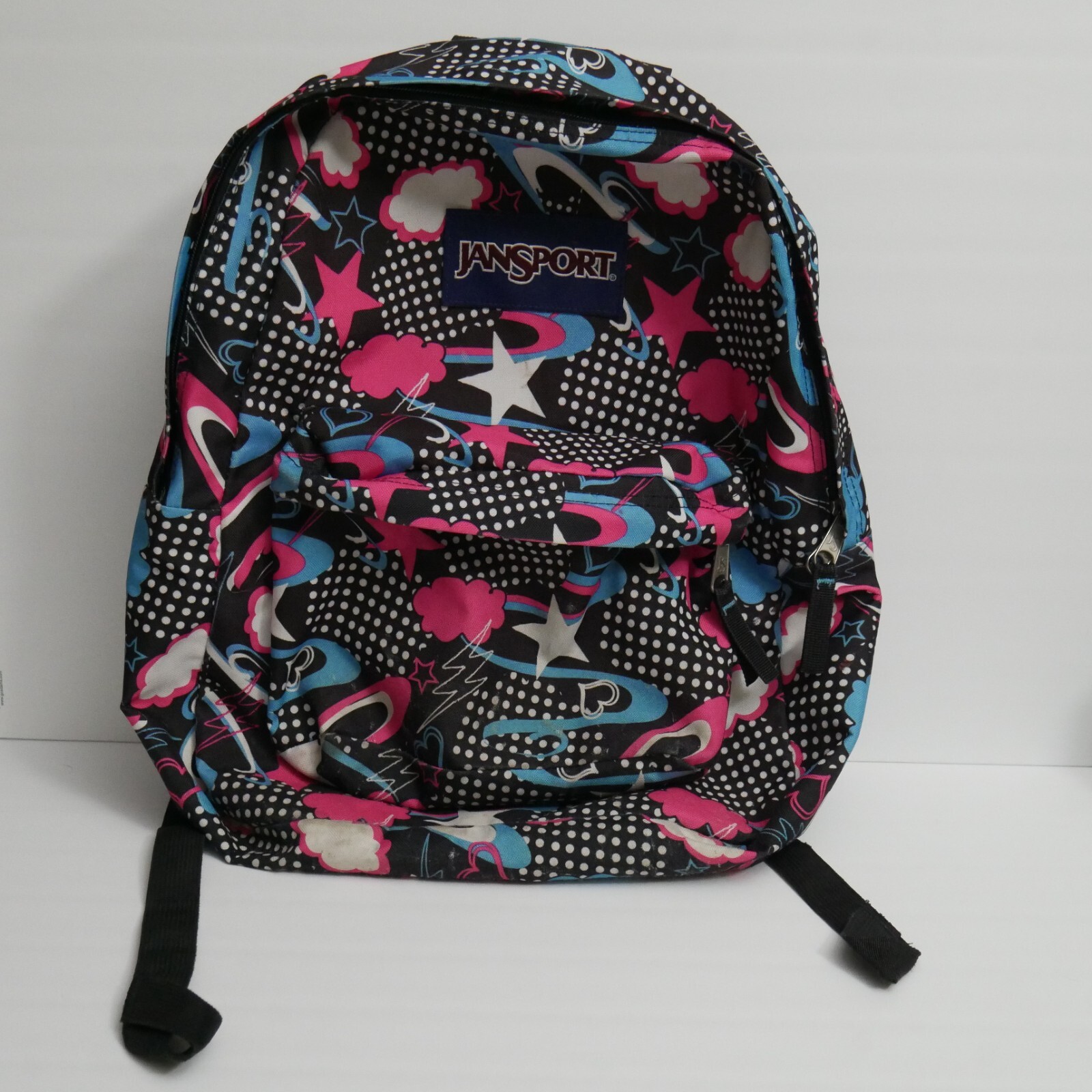 JanSport Black Backpack with pink, blue, and white do… Gem