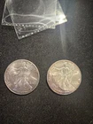 Pair of (2) 2002 American Silver Eagle CH UNC  toning / toned