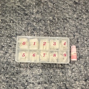 KISS Clear Short Square Artificial Nail Tips with KISS brand nail glue