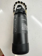 Owala FreeSip 32oz Stainless Steel Water black with custom woven handle, bottom