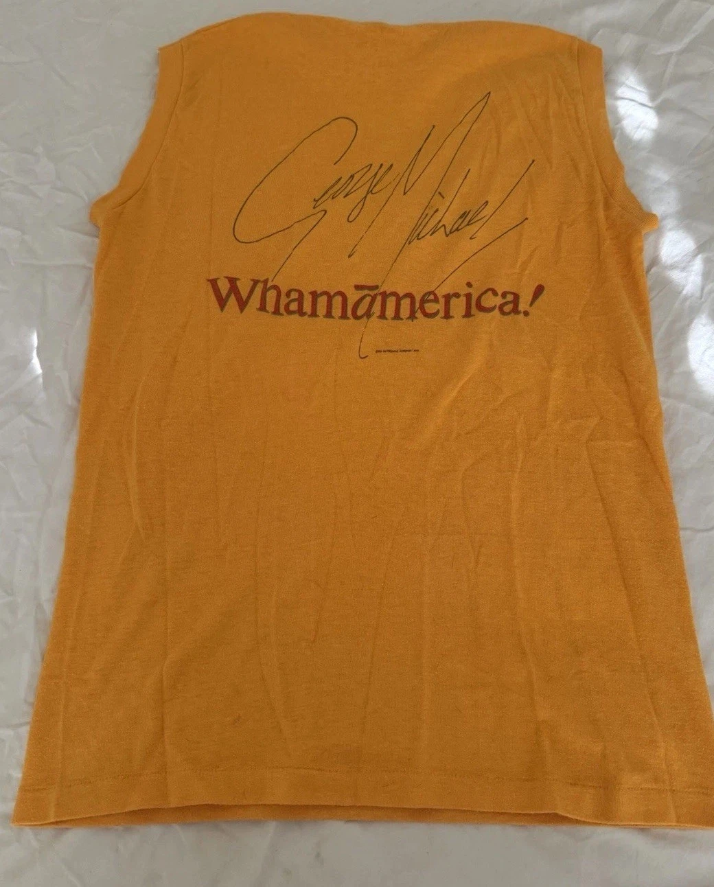 Wham! America 1985 Sleeveless Tee W George Michael & Andrew Ridgeley Signatures
Opens in a new windo