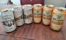 Yuengling Bock (3)  Yuengling Octoberfest (3) 12 Oz.  Opened Cans Empty