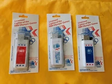 NEW NOS Vintage 1984  Set Of 3 Olympic Games Advertising Lighters Red White Blue