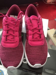 red and pink adidas trainers