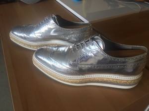 prada wingtip leather platform brogues