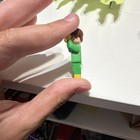 LEGO Minifigure Green Outfit, Brown Hair, Glasses Plastic Figure — photo 2