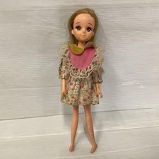 Blonde doll in floral dress, on sale