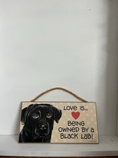 Wooden Painted Dog Sign Live Is Being Owned By A Black Lab Wall Hanging