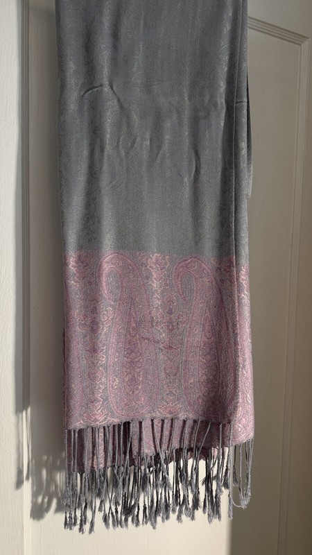 Gray and pink scarf/shawl.