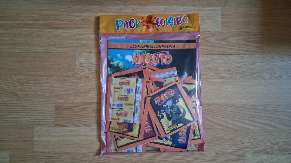 NARUTO LES AVENTURES D'UN NINJA - PACK LOISIRS ALBUM+50 POCHETTES-PANINI-2024 - - Photo 1/1