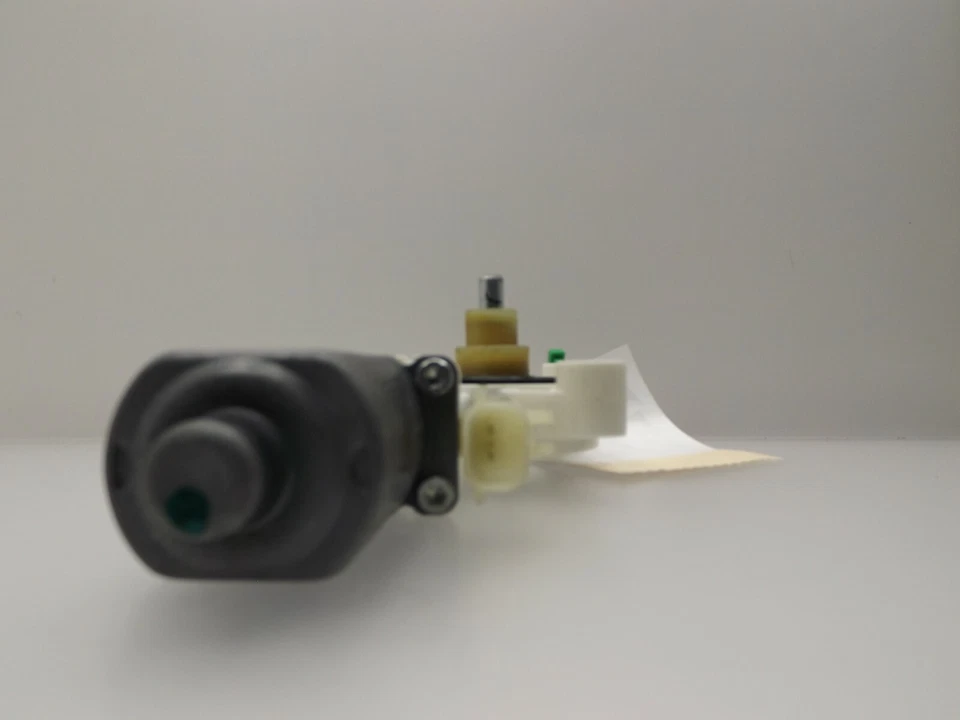 Chrysler Sebring 2007-2010 motor de ventana de puerta lateral del conductor trasero usado OEM 3006611 Foto 2 de 4