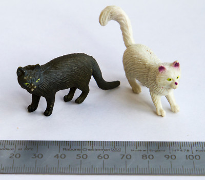 small plastic cats