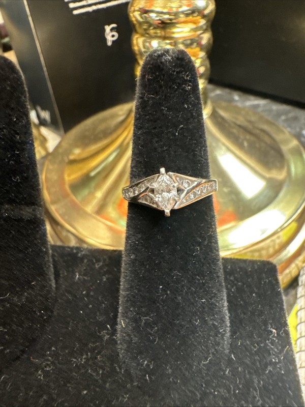 14Karat Gold 1/2Carat Center Stone 1 Smaller Side Stones Diamond Ring White Gold