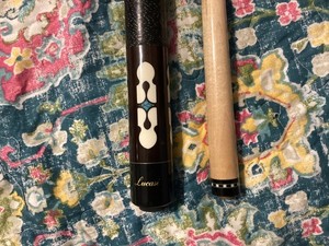 lucasi pool cue 309.  Excellent performance and condition