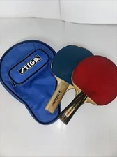 1 Vintage Harvard Ping Pong Paddle, 1 Sportcraft, 1 Stiga Case Blue, 3 Balls