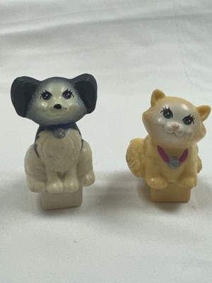 These are vintage Generation 1 Littlest Pet Shop (LPS) figures