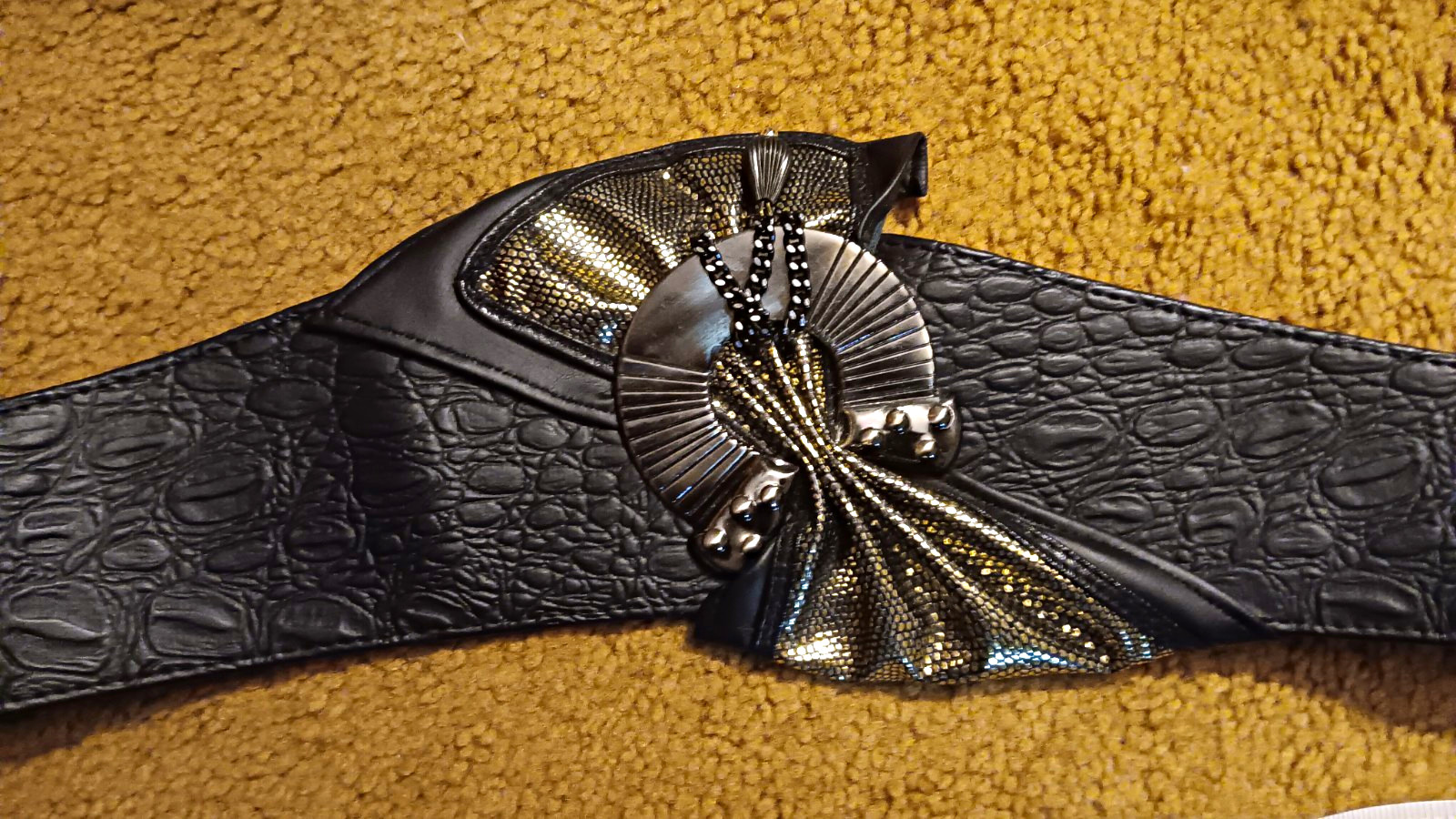 Black textured leather adjustable waist belt with retro gold buckle