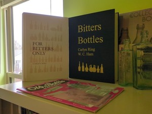 Two Antique Bitters Bottles Books
