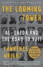 The Looming Tower: Al-Qaeda and the Road to 9/11 - Paperback - VERY GOOD