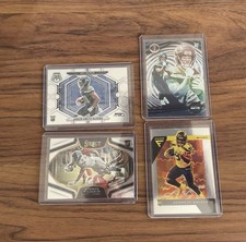 Jaxon Smith Njigba Kenneth Walker Rookie Cards.