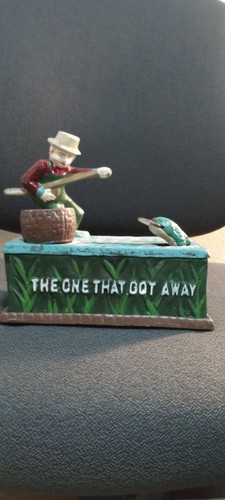 The One That Got Away Mechanical Bank Cast Iron Fisherman Fish Collectible