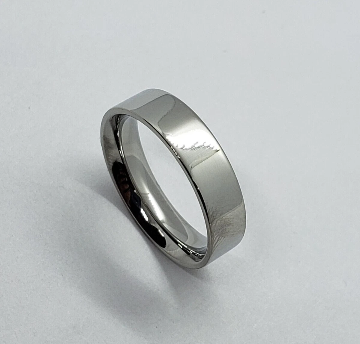 Surgical steel ring in silver colour, black strip decorated with ornament,  7 mm | Jewellery Eshop EU