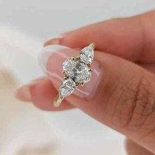 2 Ct Oval Cut Moissanite Three Stone Engagement Ring In 14K Yellow Gold Plated