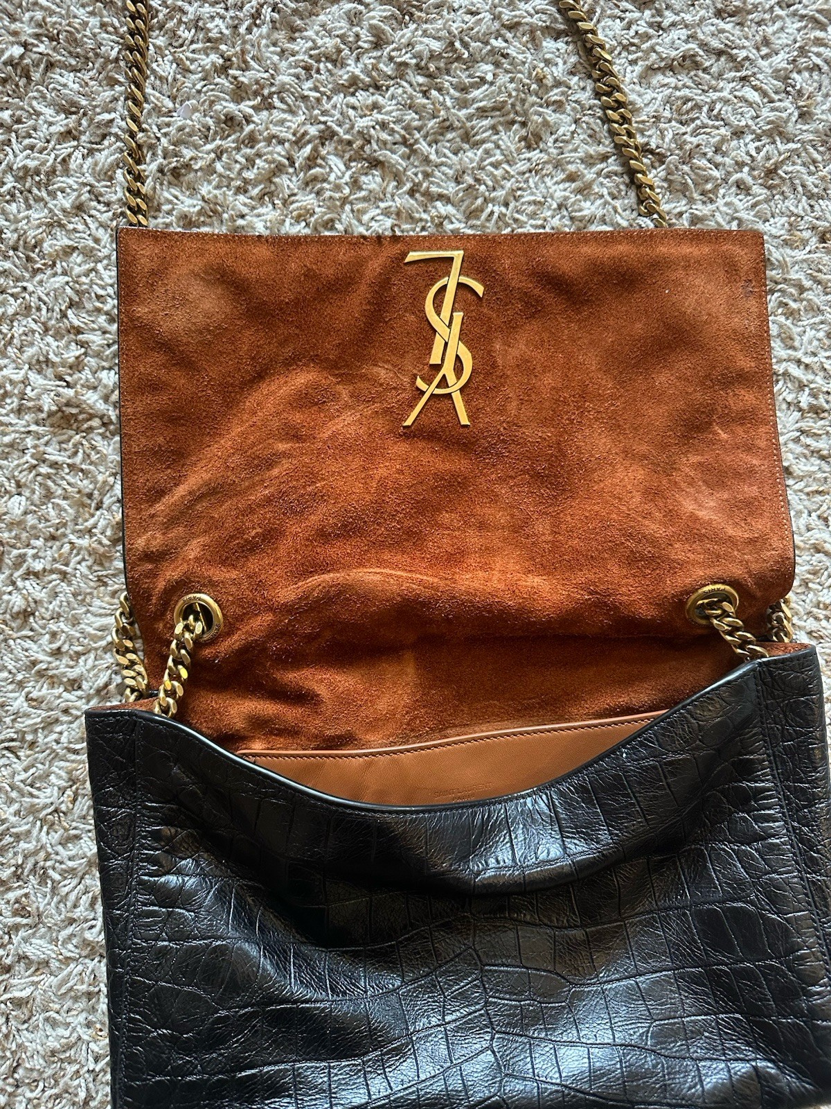 Borsa a tracolla Saint Laurent reversibile Kate con interno in pelle di pitone.