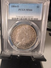 1884 O Morgan Silver Dollar MS 66 FANTASTIC toning on reverse