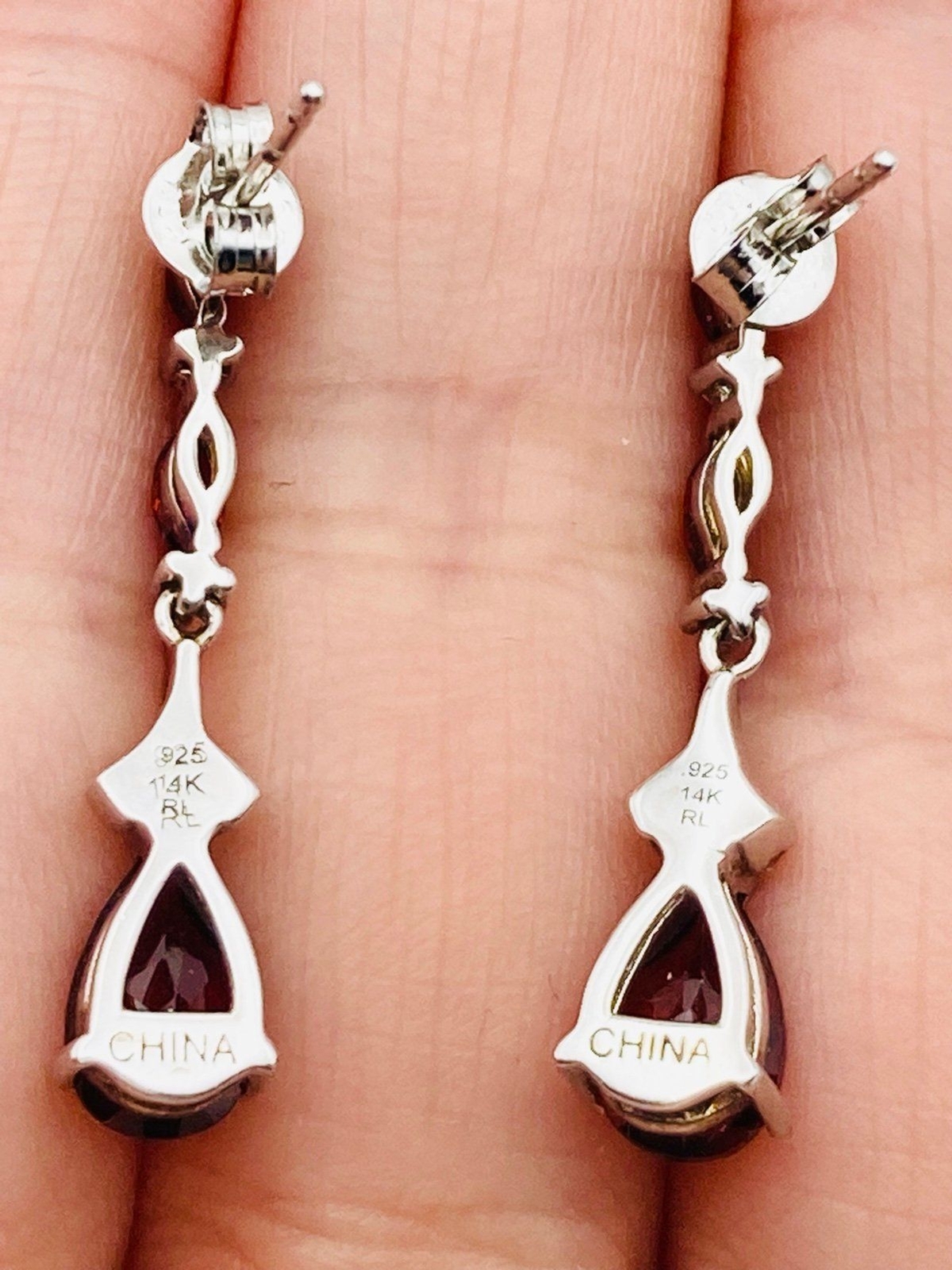 Zales natural garnet diamond earrings setting in sterling silver and 14k