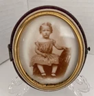 Opalotype Girl in Oval Frame. Opaltype Early Photography Photo. Daguerreotype