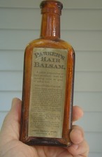Antiguo BÁLSAMO PARA EL CABELLO PARKER'S etiquetado y en relieve botella de medicina