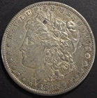 1883-S MORGAN DOLLAR AU TONED