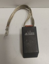 NEW OLD STOCK HELWIG 2-7/8" X 1-1/4" X 1" CARBON BRUSH L-2