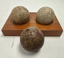 Three Antique Golf Balls