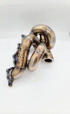 SYP MITSUBISHI LANCER EVOLUTION 7/8/9 BOTTOM MOUNT STAINLESS MANIFOLD T3T4VBAND