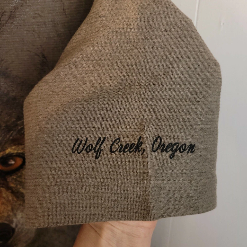 VTG Hazelwoods NWT Brown GRAPHIC TEE Wolf creek T-Shirt L destination ribbed - Imagem 4 de 4