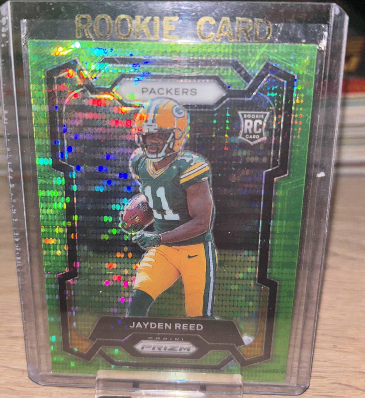 2023 Panini Prizm - Rookies Neon Green Pulsar Prizm #334 Jayden Reed RC Packers