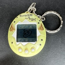1997 Tamagotchi Angel Yellow With Gold Wings Virtual Pet Bandai Vintage TESTED 