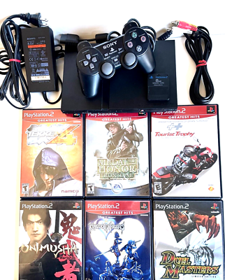 SONY PLAYSTATION 2 SLIM CONSOLE BUNDLE WITH SHOCK CONTROLLER & SIX
