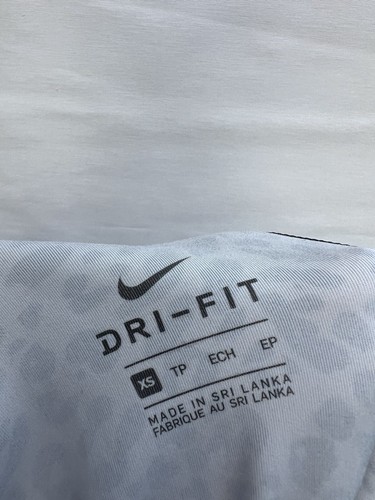 Nike Women's One Luxe Tight Fit Mid Rise Cheetah Print Leggings (White/Black .XS - Picture 5 of 7