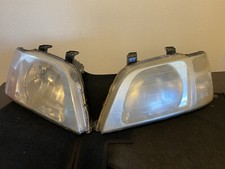 Phares passager HONDA CR-V 1997-2001 cassés une languette, quelques rayures