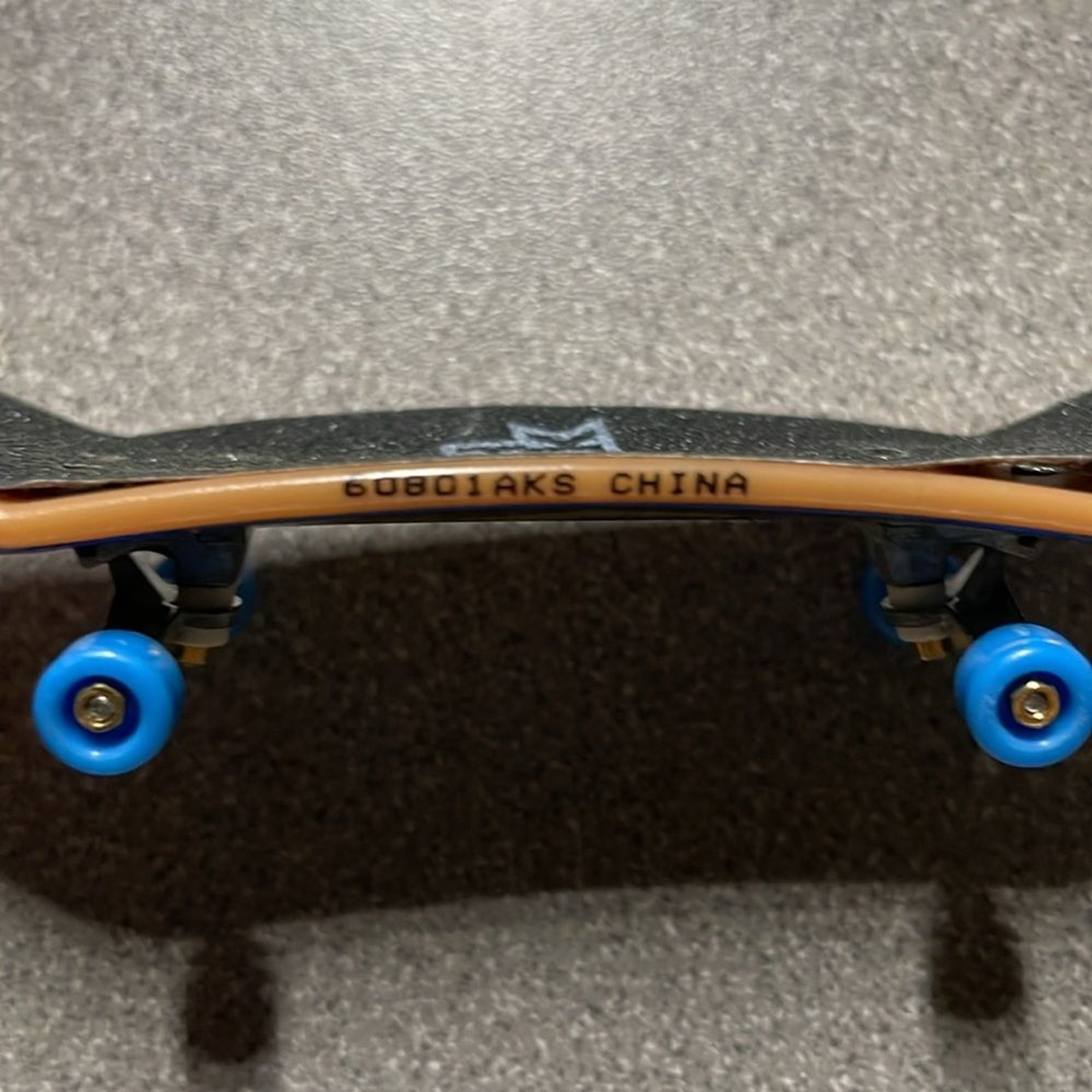 Tech Deck Mini Skateboard featuring Nick Tucker and a unique wolf design.