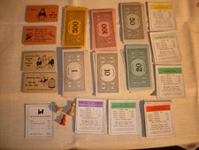 1940s Parker Brothers Monopoly Game Parts. Money, cards wooden player pieces.