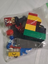 BAG OF LARGE LEGOS AND OTHER ITEMS BIN B