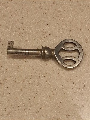 Old Intricate Metal Skeleton Clock Key