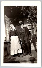Vtg B&W Snapshot Elderly Couple Holding Canes Front Porch Bonnet Suit Sept 1935